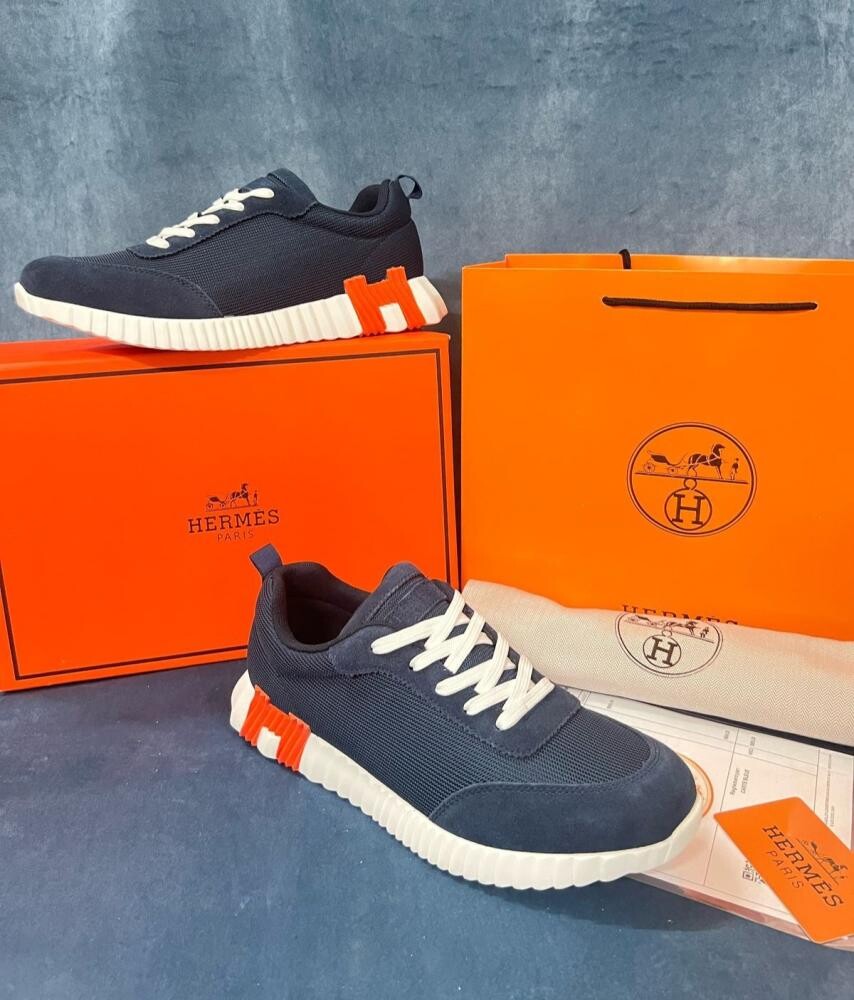 حذاء Hermès Jimmy Sneaker لون كحلي بلمسة برتقالية في الكويت